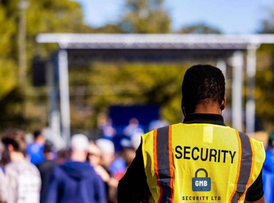 GMB Security guard watching the crowd at an outdoor event